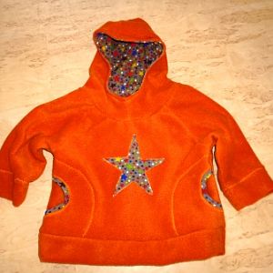 Fleeceüberzieher in orange mit Sternen