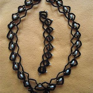 Halskette und Armband Occhi mit Perlen