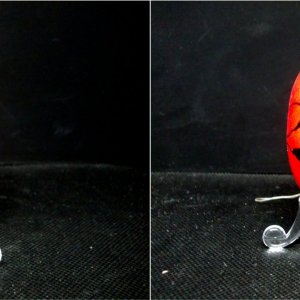 schwarz grundiertes Ei mit roter Schleife 2er Bild klein.JPG