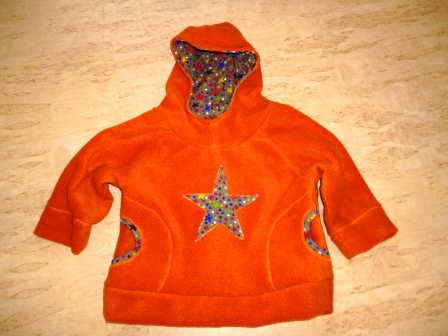 Fleeceüberzieher in orange mit Sternen