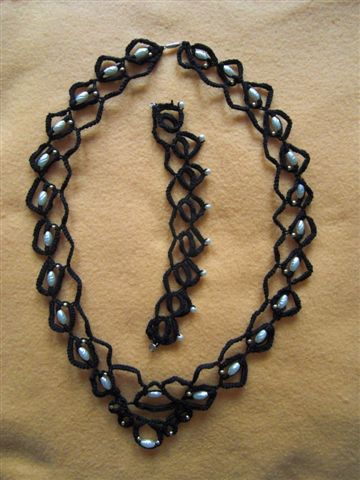 Halskette und Armband Occhi mit Perlen
